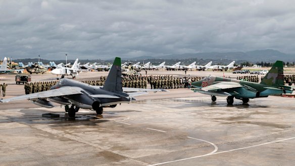 A line-up of Russian troops at the Hemeimeem air base in Syria. in March.