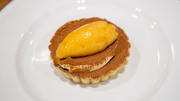 Chocolate tartlet, creme fraiche and cloud berry sorbet. 