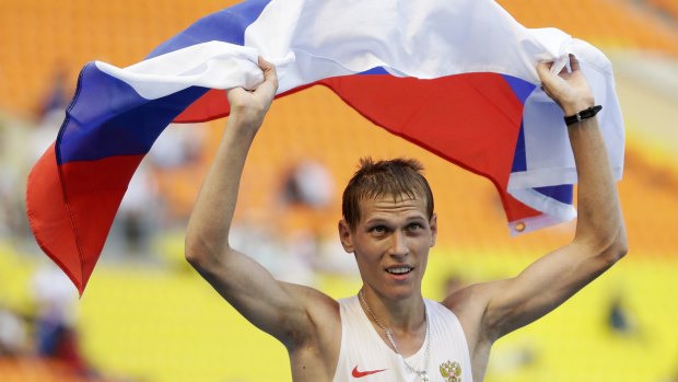 Russia's Mikhail Ryzhov celebrates winning silver in the men's 50km walk at the World Athletics Championships in Moscow in 2013.