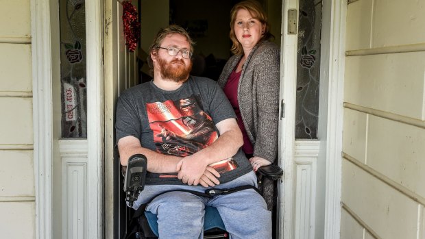 Shane Barnbrook, with wife Sarah, is suing two hospitals for negligent care that left him a quadriplegic.