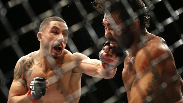 Winning streak: Robert Whittaker hits Rafael Natal during what became his fifth straight win in the UFC.