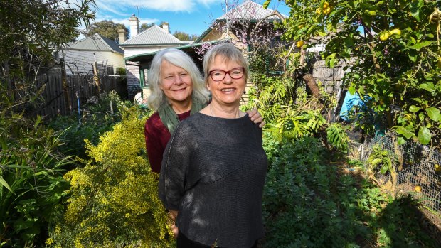 Greens senator Janet Rice with her wife Penny Whetton in their Melbourne home.