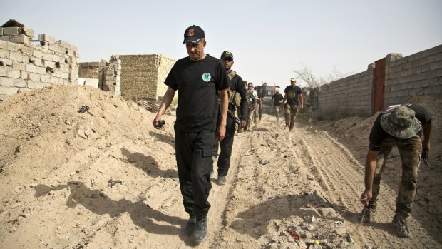 Iraqi special forces on the edge of the Shuhada neighbourhood in Islamic State-held Fallujah last week. 