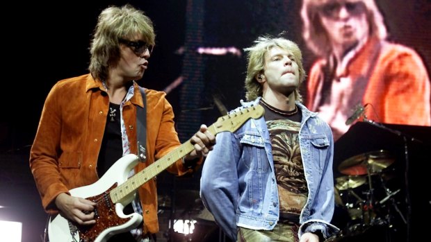 Richie Sambora (left) and Jon Bon Jovi performing together in 2001. 