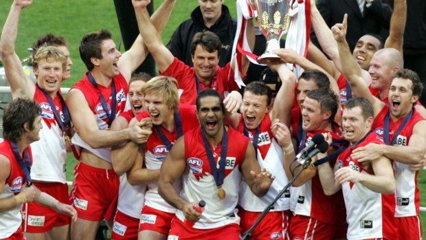 Once were ugly ducklings: The Sydney Swans celebrate after winning the AFL Grand Final in 2005.
