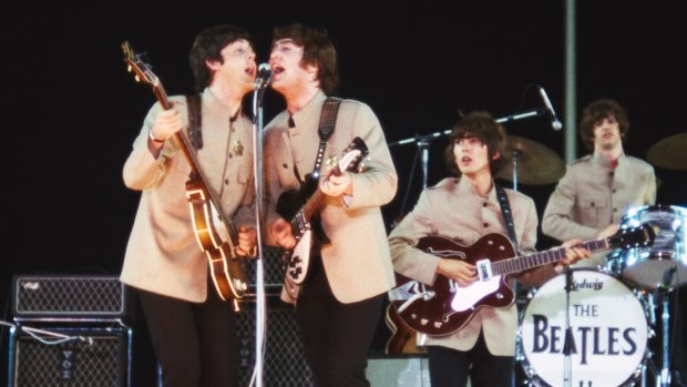 The Beatles, (from left) Paul McCartney, John Lennon, George Harrison and Ringo Starr, play at Shea Stadium, New York.