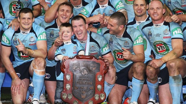 NSW lifted the State of Origin trophy at Suncorp Stadium in 2014.