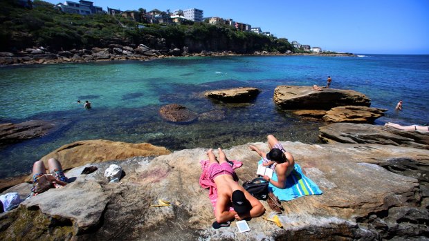 Sunbathers at Gordons Bay in Sydney's east.