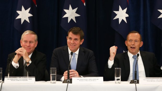 WA Premier Colin Barnett, NSW Premier Mike Baird and Prime Minister Tony Abbott during a joint press conference after the Council of Australian Governments meeting in Sydney.