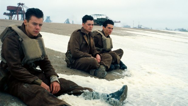 (From left) Harry Styles, Aneurin Barnard and Fionn Whitehead as young soldiers on the beaches of Dunkirk.
