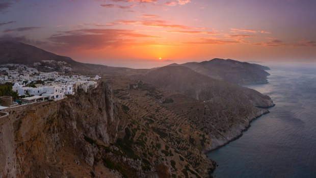 View of Hora, a small village in Folegandros, at sunset.