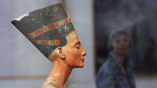 Visitors gaze upon the 3400-year old bust of Egypt's queen Nefertiti at the Neues Museum in Berlin in 2007. 