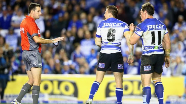 Difference of opinion: Josh Reynolds exchanges words with referee David Munro.