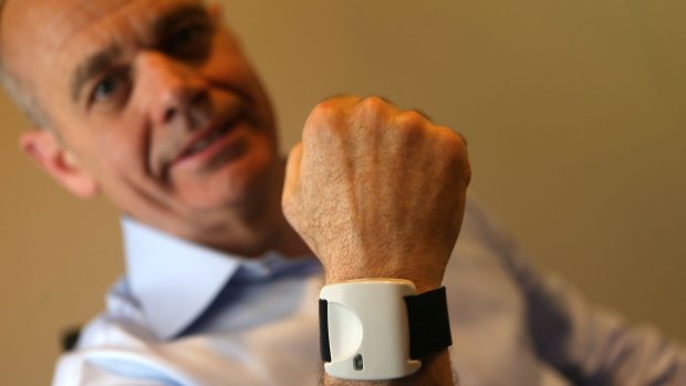 Global Kinetics Corporation chief executive Andrew Maxwell wears a Parkinson's KinetiGraph medical device, which helps doctors treat patients with movement disorders. GKC has used crowdfunding site OurCrowd to raise money to take the product to the American market.