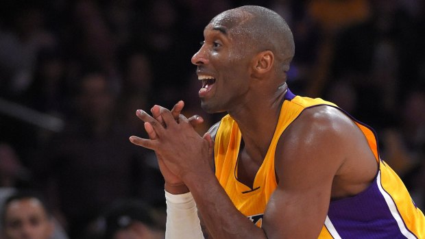 No way: Kobe Bryant pleads with the referees during the Lakers' loss to the Suns.