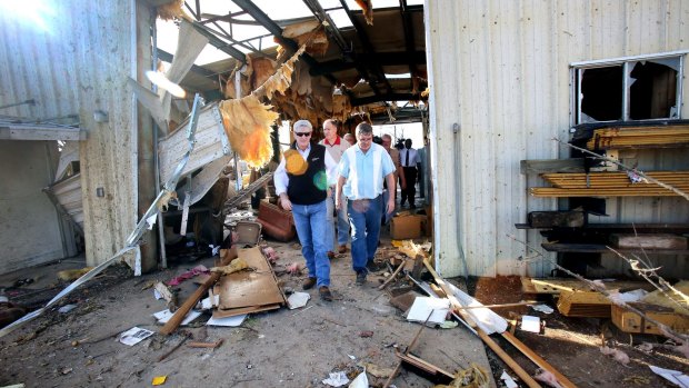 Mississippi Governor Phil Bryant inspects tornado storm damage to a MDOT facility in Ashland, Mississippi.