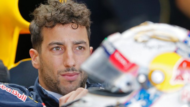 Third place ... eventually: Daniel Ricciardo launched a stinging attack on Sebastian Vettel, which saw him promoted to the podium.