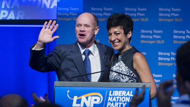 Campbell Newman, pictured with wife Lisa, waved farewell to politics after being voted out as premier.