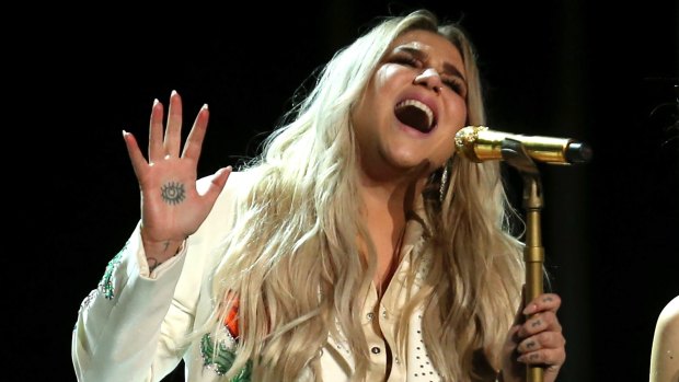 Kesha delivers an emotional performance of  'Praying' at the 60th annual Grammy Awards.