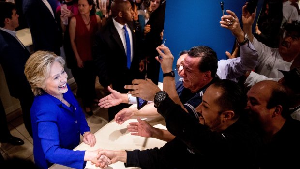 Democratic presidential candidate Hillary Clinton greets employees at the Mirage in Las Vegas on Wednesday.
