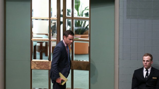 Liberal MP Andrew Laming leaves after being named by Speaker Bronwyn Bishop ahead of Question Time at Parliament House in Canberra on Wednesday.