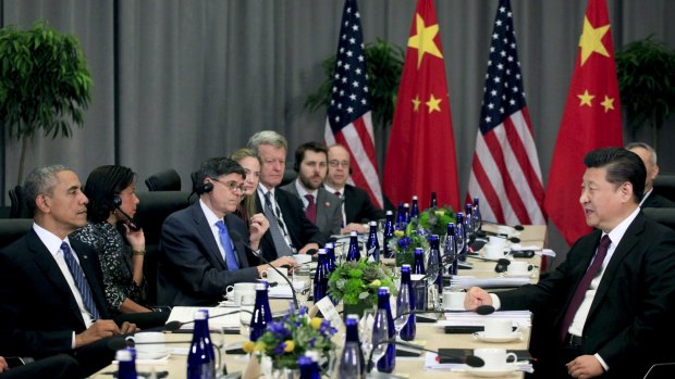 US President Barack Obama and his Chinese counterpart Xi Jinping speak at a bilateral meeting during the Nuclear Security Summit in Washington.