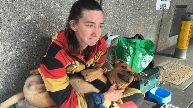 Homeless woman Jodi Cooper with her dog, Brownie.