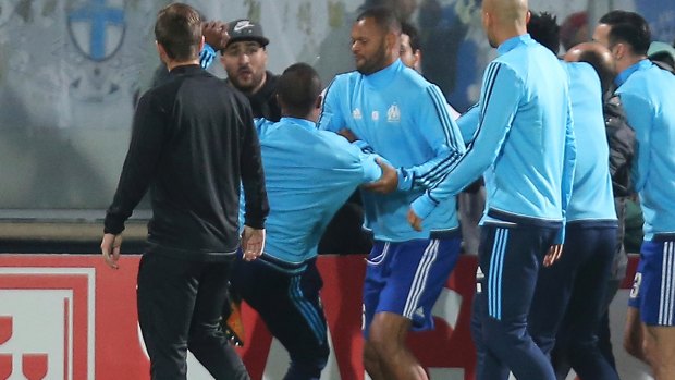Patrice Evra clashes with fans.