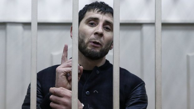 Zaur Dadayev, charged with the murder of Boris Nemtsov, inside a defendants' cage in Moscow.