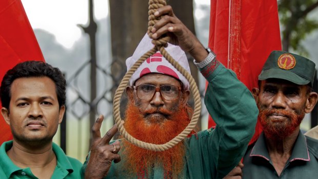 Bangladeshi activists who have been campaigning for capital punishment for war criminals demonstrate outside the Supreme Court on Wednesday. 