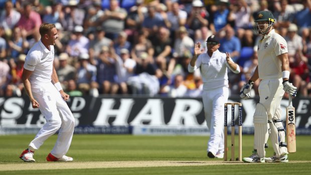 Stuart Broad celebrates after trapping Shane Watson early on day three of the first Test.