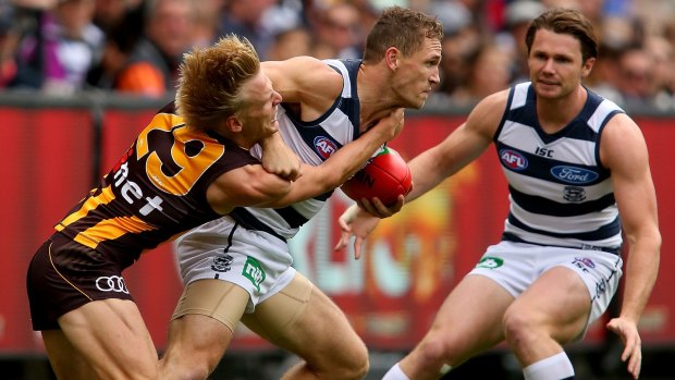 Will Langford, Joel Selwood and Patrick Dangerfield in action during the game between Hawthorn and Geelong.