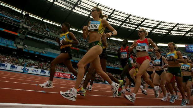 Kerryn McCann leads the field at the start of the marathon in the MCG.