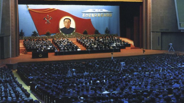 In this Oct. 10, 1980 photo provided by the Korea News Service (KNS), delegates attend a convention of North Korea's Workers' Party in Pyongyang, North Korea. North Korea, the world?s last great master of socialist spectacle, is likely to deliver a big one when its ruling party holds its first congress in 36 years later this week, scheduled to begin on Friday, May 6, 2016. Words at top reads: "Workers of the World, Unite" and on bottom reads: "The 6th Congress of the Workers' Party of Korea." (Korea News Service via AP) JAPAN OUT UNTIL 14 DAYS AFTER THE DAY OF TRANSMISSION
