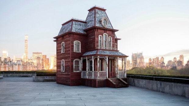 Cornelia Parker's <i>Transitional Object (PsychoBarn)</i> against the New York skyline.