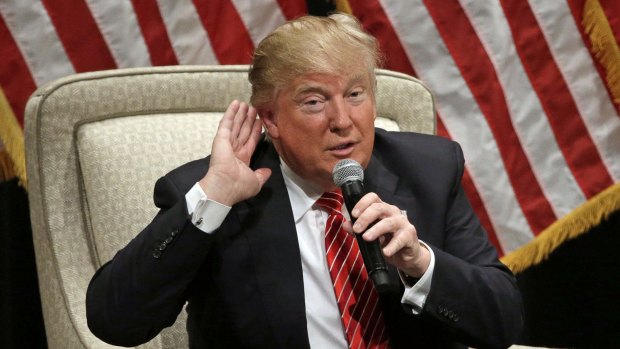 Republican presidential candidate Donald Trump gestures as he speaks at a rally at Lenoir-Rhyne University in Hickory, N.C.