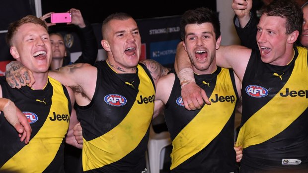 Tigers smile: (from left) Josh Caddy, Dustin Martin, Trent Cotchin and Dylan Grimes after winning the second qualifying final.