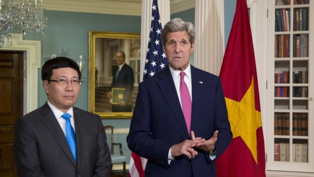 US Secretary of State John Kerry with Vietnamese Deputy Prime Minister and Foreign Minister Pham Binh Minh in Washington.