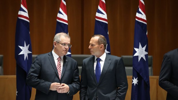 Social Services Minister Scott Morrison and Prime Minister Tony Abbott on Friday.