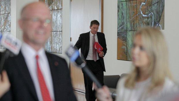 Senator Cory Bernardi arrives to listen in.