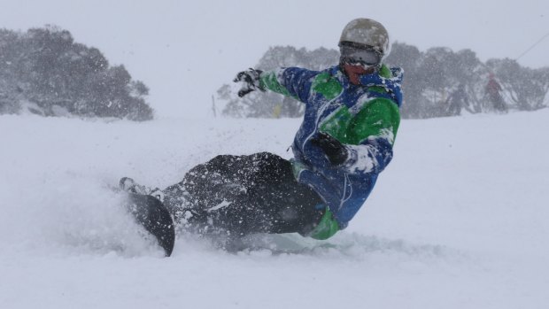 A snow boarder at Perisher on Friday.