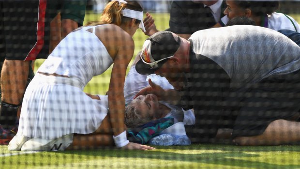 Mattek-Sands suffered an acute knee injury on the 'slippery' courts at Wimbledon.