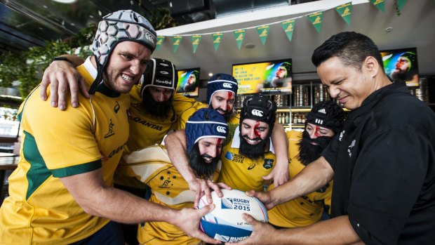 Former Wallaby Ben Alexander with The Dock staff dressed as Wallaby Scott Fardy up against chef Jon ''Kiwi Jon'' Turner in the lead-up to the Rugby World Cup final on November 1.