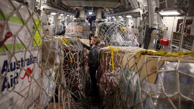 Foreign Minister Julie Bishop inspects Australian aid supplies bound for Vanuatu in March. 