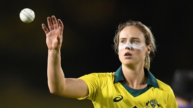 Ellyse Perry of Australia receives the ball during the second One Day International match between Australia and England at Coffs Harbour International Stadium.