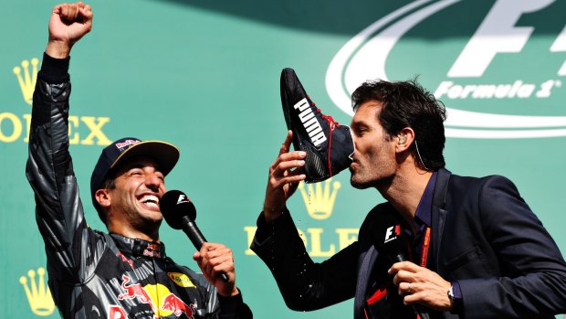 Webber drinking champagne from Daniel Ricciardo's racing shoe after the Australian driver's second-placed finish in the Belgian Grand Prix in August.