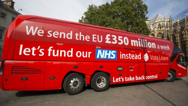 A ''Vote Leave'' battle bus is parked outside the Houses of Parliament in Westminster by Greenpeace before being rebranded on July 18.
