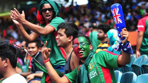 From left, Imran Hossain, Zidan Gazi and Emamul Milon all of Sydney at Manuka Oval in Canberra to see Afghanistan take on Bangladesh in the ICC Cricket World Cup.