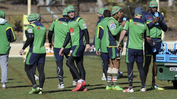 Raiders players trained in beanies and compression clothing on Wednesday to get used to the Townsville climate.