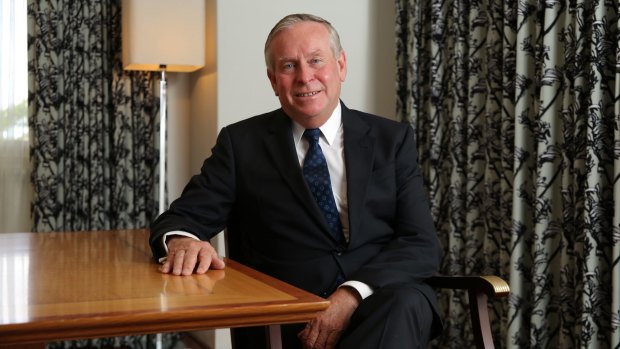 Colin Barnett has hit out at mining giants for flooding the iron ore market.